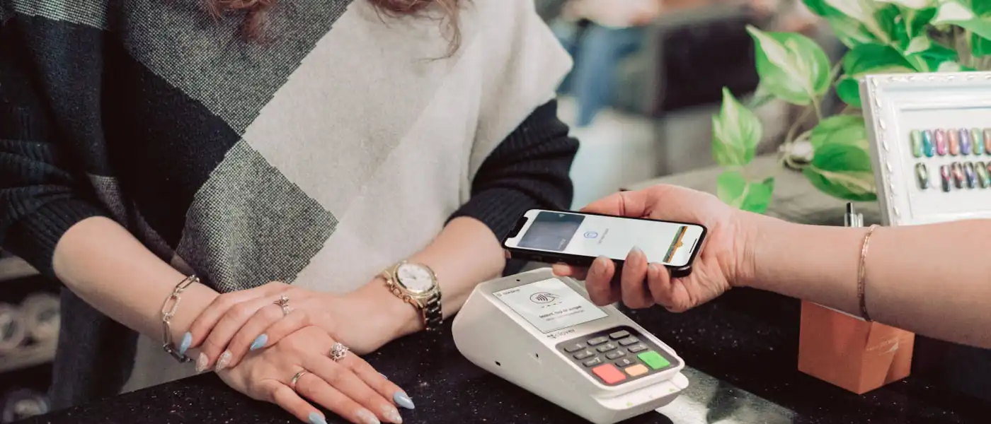 Customer paying with mobile wallet on Clover Compact